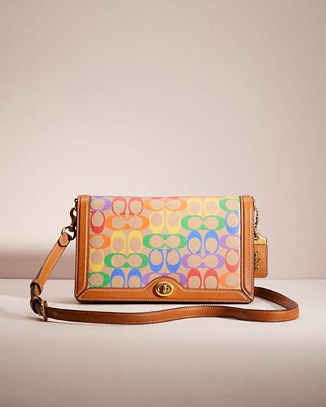 COACH®,RESTORED RILEY IN SIGNATURE CANVAS,Signature Coated Canvas,Brass/Tan Penny Multi,Front View