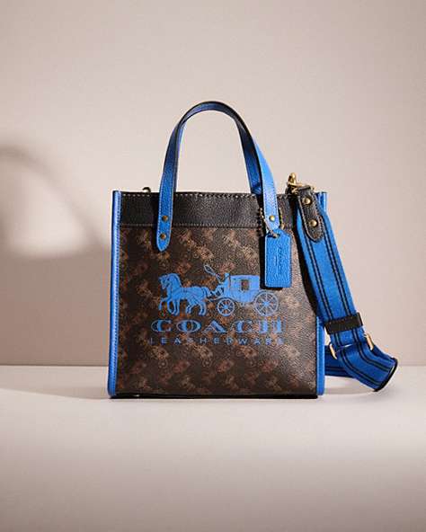 COACH®,RESTORED FIELD TOTE 22 WITH HORSE AND CARRIAGE PRINT AND CARRIAGE BADGE,Brass/Truffle Blue Fin,Front View