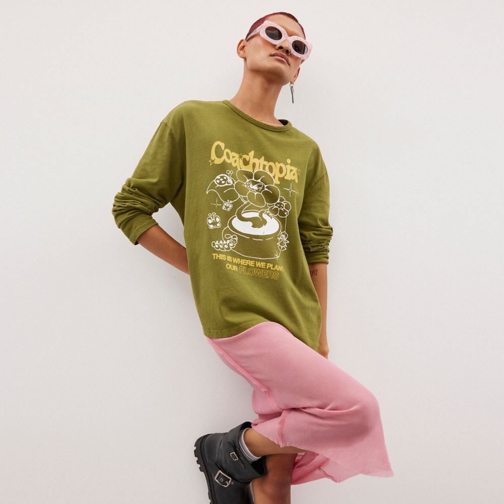 COACH®,Long Sleeve T Shirt With Flower Pot Print,Recycled Cotton,Cotton,T Shirt,Logo,Word Embellishment,Eco-Friendly,Susta...,Olive,Scale View