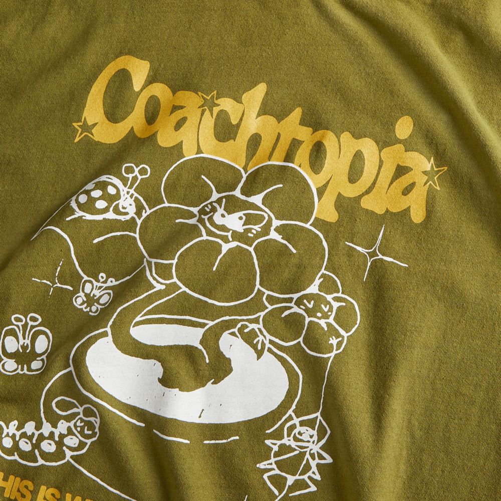 COACH®,Long Sleeve T Shirt With Flower Pot Print,Recycled Cotton,Cotton,T Shirt,Logo,Word Embellishment,Eco-Friendly,Susta...,Olive,Closer View