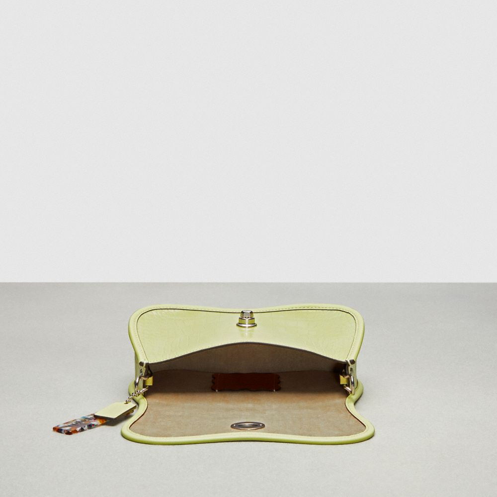 Shop Coach Wavy Dinky Bag In Croc Embossed Topia Leather In Pale Lime