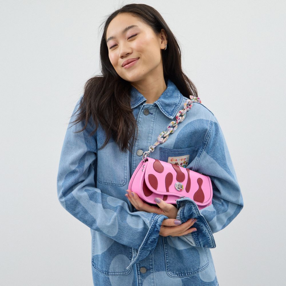 COACH®,Wavy Dinky Bag In Coachtopia Leather With Lava Appliqué,,Detail View