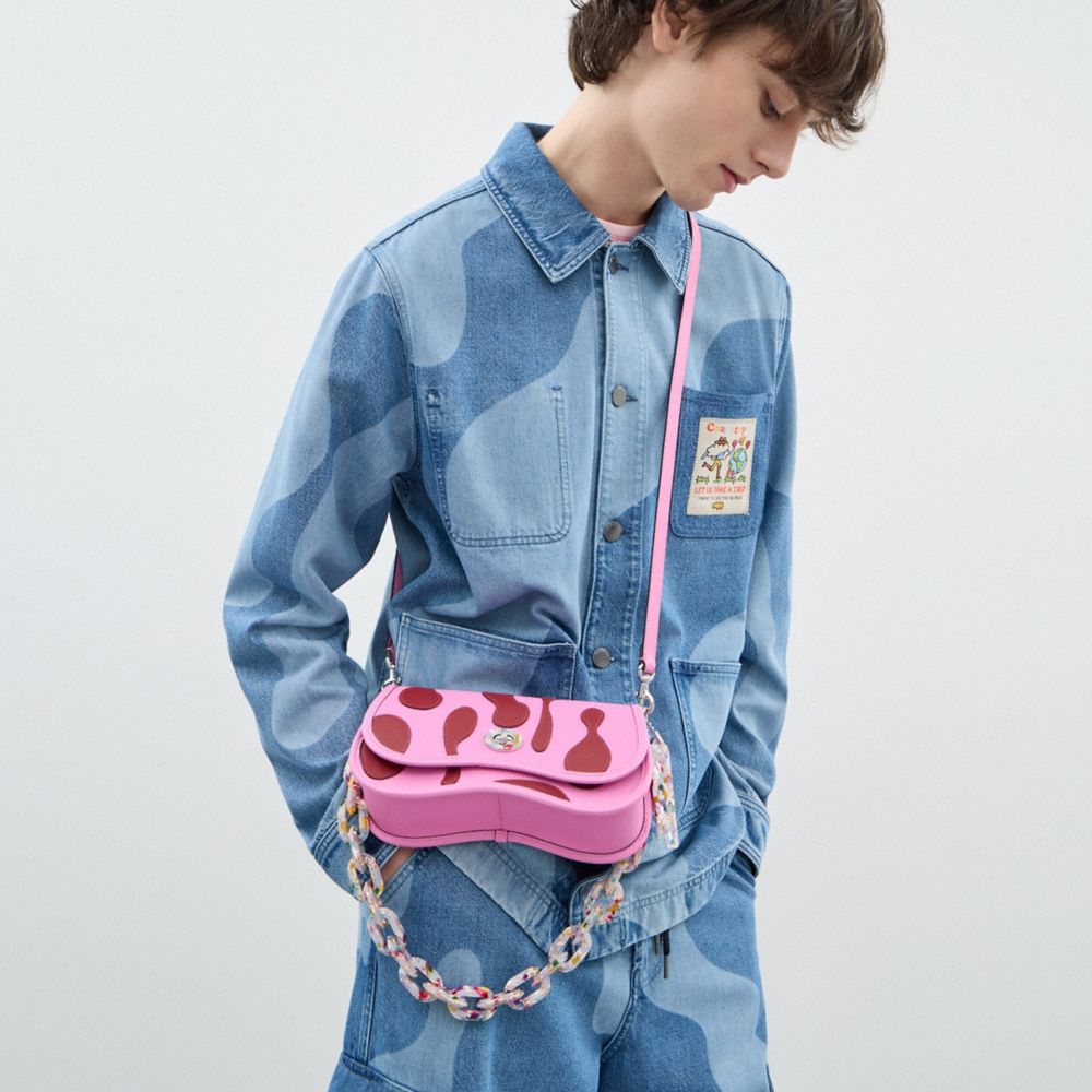 COACH®,Wavy Dinky Bag In Coachtopia Leather With Lava Appliqué,,Detail View