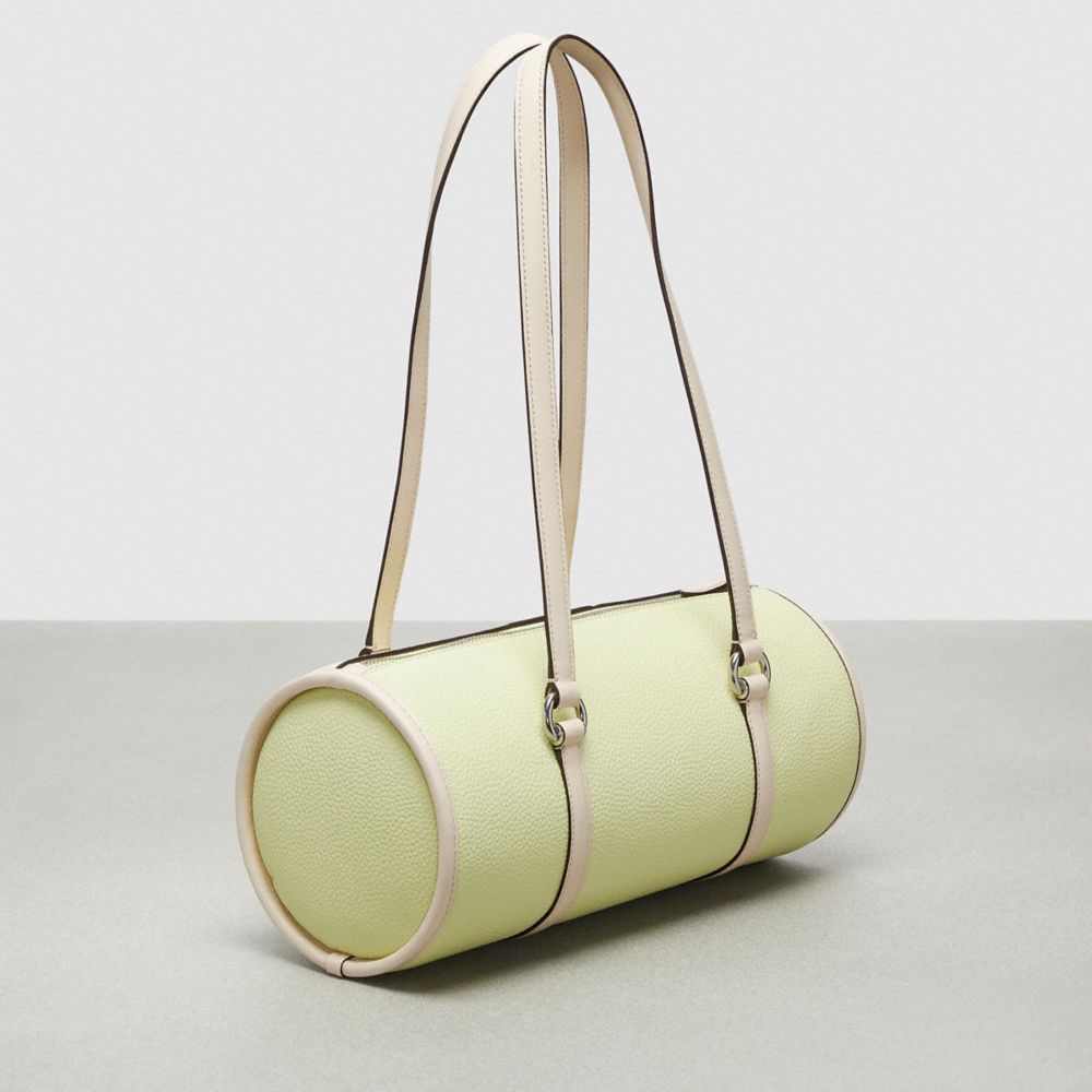 COACH®,Barrel Bag In Pebbled Coachtopia Leather,Medium,Pale Lime/Cloud,Angle View