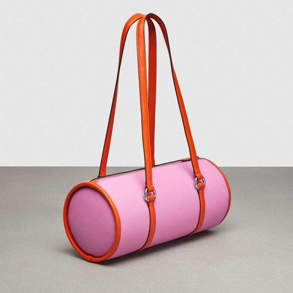 COACH®,Barrel Bag In Pebbled Coachtopia Leather,Medium,Bright Magenta/Sun Orange,Angle View