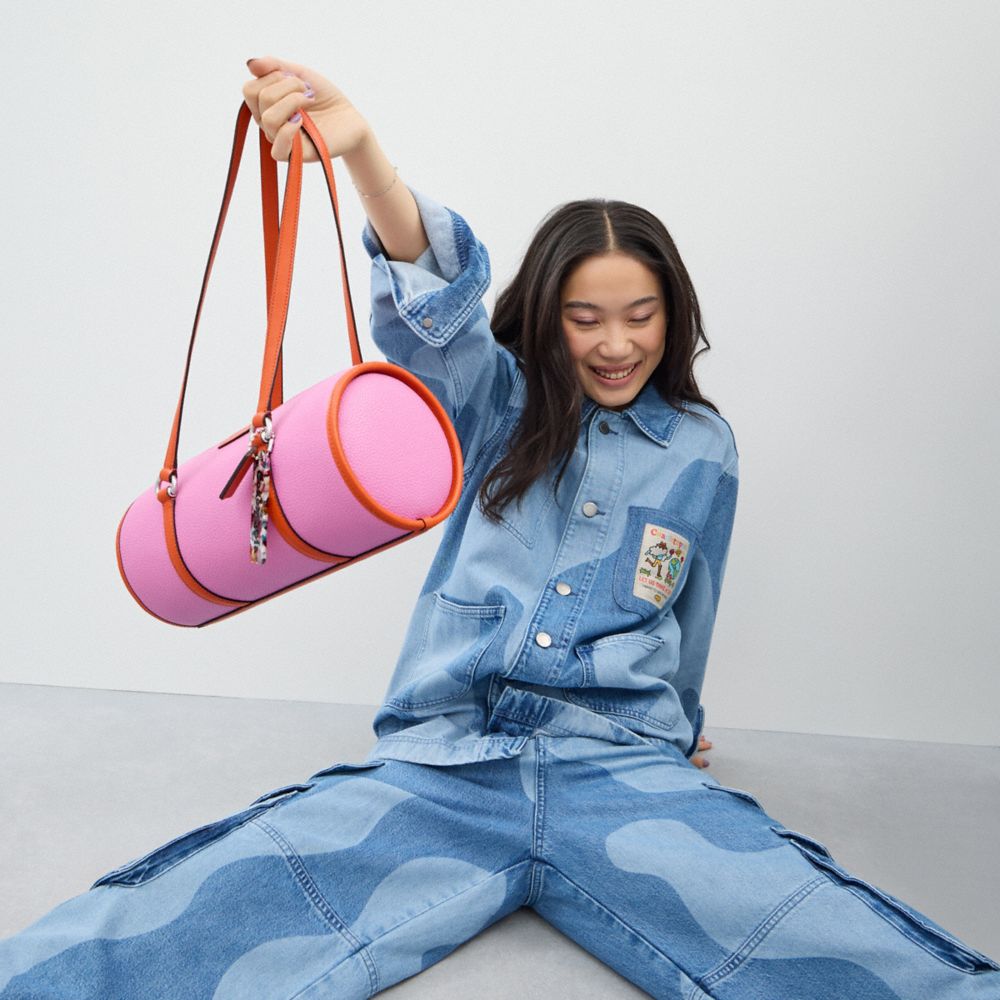 COACH®,Barrel Bag In Coachtopia Leather,Leather,Acrylic,Barrel Bag,Plastic,Tag Embellishment,Silver Metal,Casual,Pink,Detail View