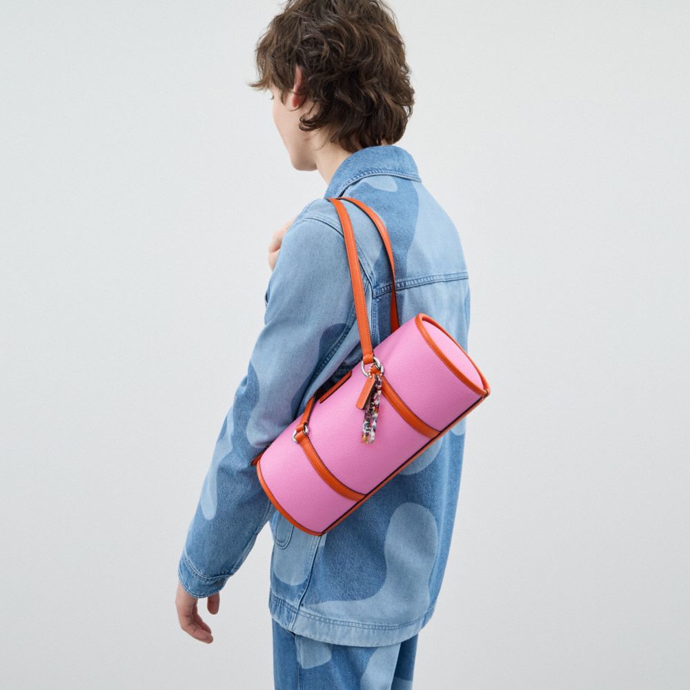 COACH®,Barrel Bag In Coachtopia Leather,Leather,Acrylic,Barrel Bag,Plastic,Tag Embellishment,Silver Metal,Casual,Pink,Detail View
