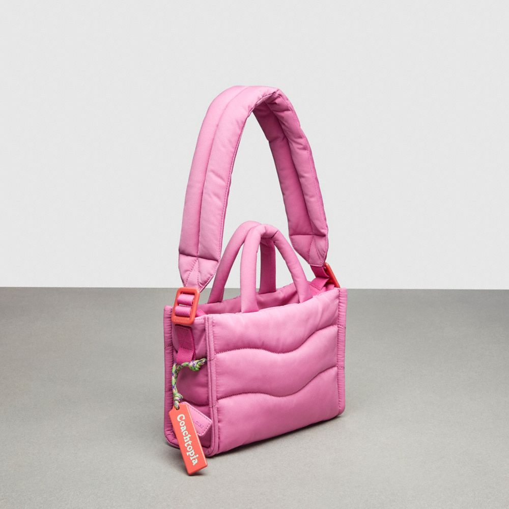 COACH®,Coachtopia Loop Mini Puffy Tote,Recycled Polyester,Medium,Coachtopia Loop,Bright Magenta,Angle View