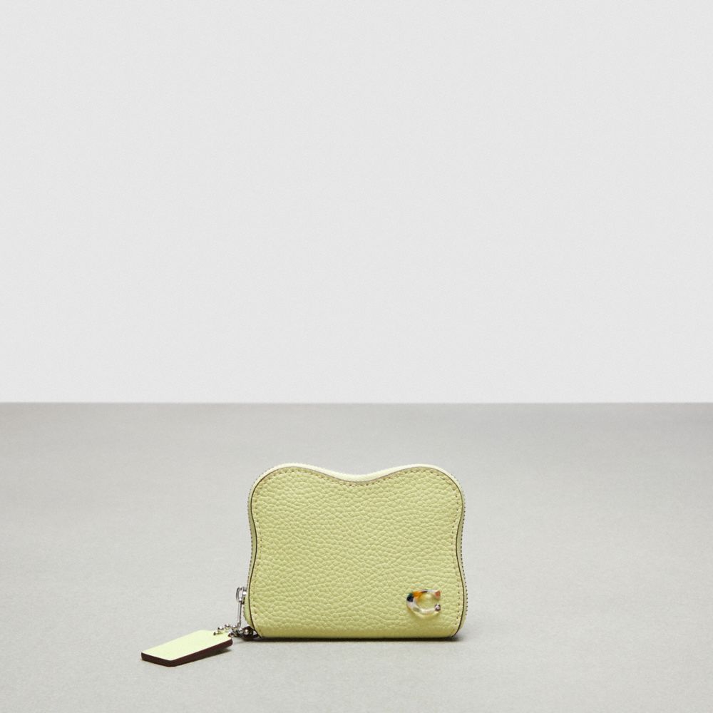 COACH®,Wavy Zip Around Wallet In Coachtopia Leather,Mini,Pale Lime,Front View image number 0