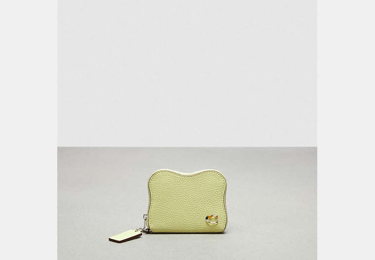 COACH®,Wavy Zip Around Wallet In Coachtopia Leather,Mini,Pale Lime,Front View image number 0