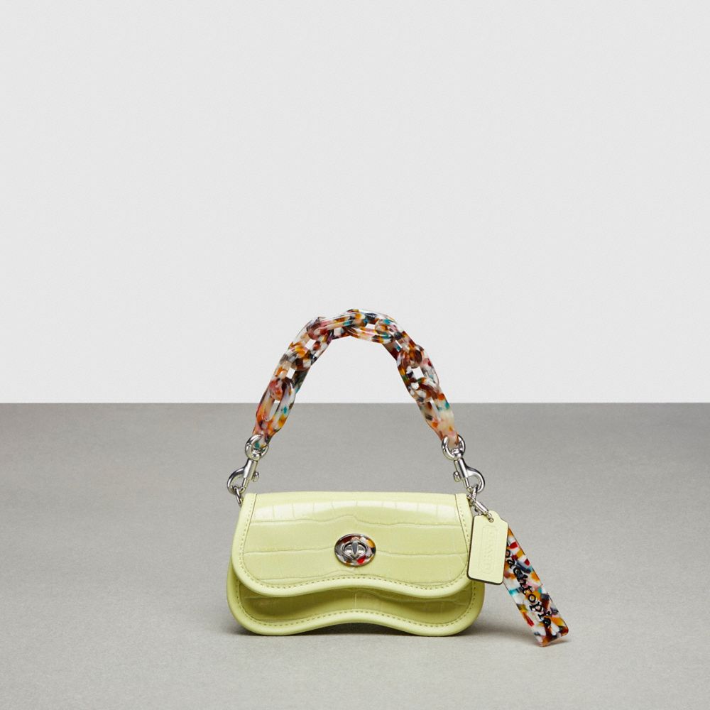 Shop Coach Mini Wavy Dinky With Crossbody Strap In Croc Embossed Topia Leather In Pale Lime