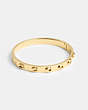 COACH®,PEGGED SIGNATURE HINGED BANGLE,Gold,Front View