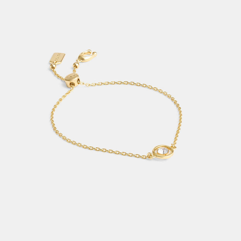 Shop Coach Halo Round Slider Bracelet In Gold