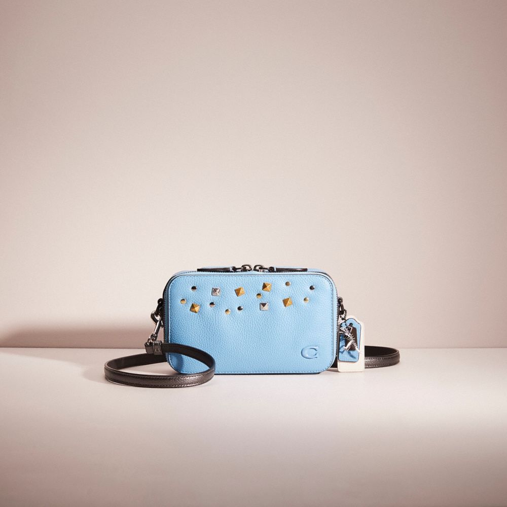 Coach slim phone on sale crossbody with rivets