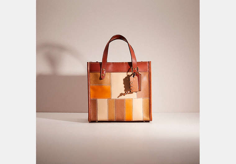 COACH®,UPCRAFTED FIELD TOTE 22 IN SIGNATURE CANVAS WITH HORSE AND CARRIAGE PRINT,Mix-and-Match,Brass/Tan Truffle Rust,Front View