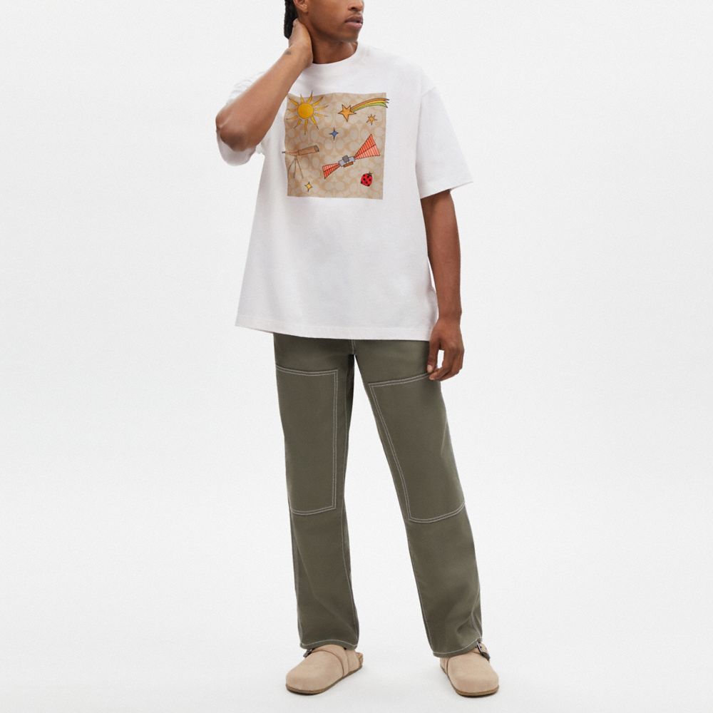 公式】COACH – コーチ | 【COACH X OBSERVED BY US】Tシャツ