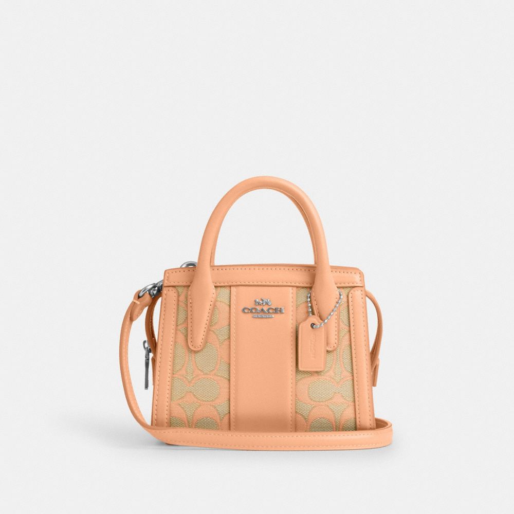 COACH®,ANDREA MINI CARRYALL IN SIGNATURE JACQUARD,Non Leather,Sv/Faded Blush,Front View