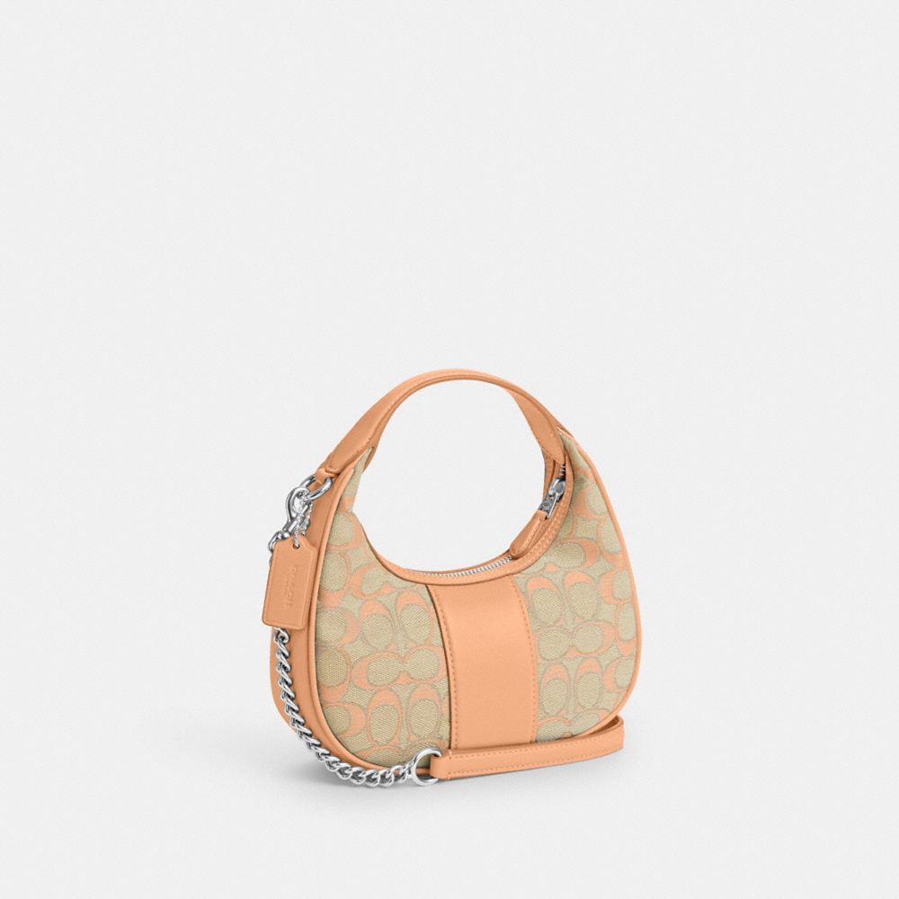 COACH®,CARMEN MINI CROSSBODY IN SIGNATURE JACQUARD,Non Leather,Sv/Faded Blush,Angle View