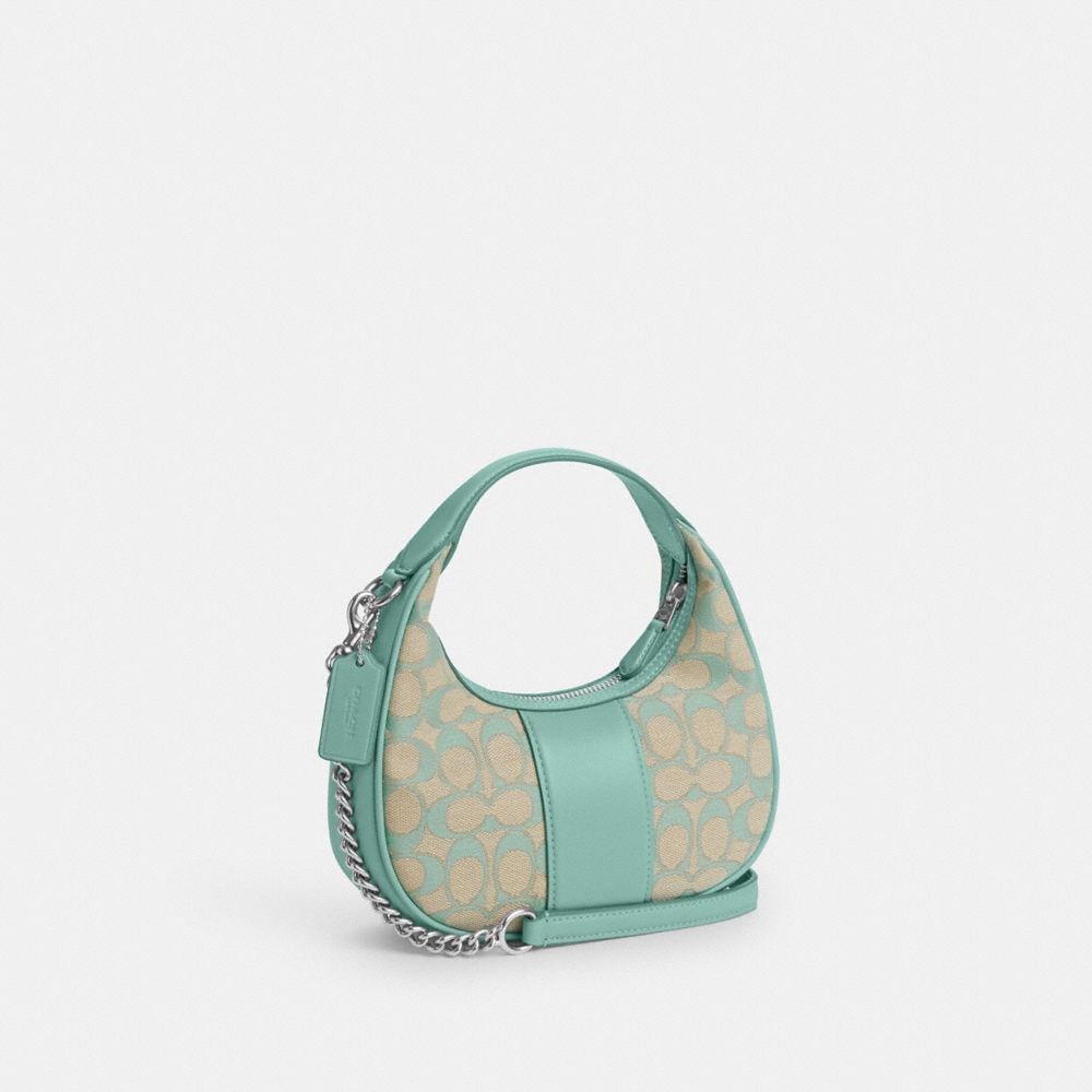 COACH®,CARMEN MINI CROSSBODY IN SIGNATURE JACQUARD,Non Leather,Sv/Faded Blue,Angle View