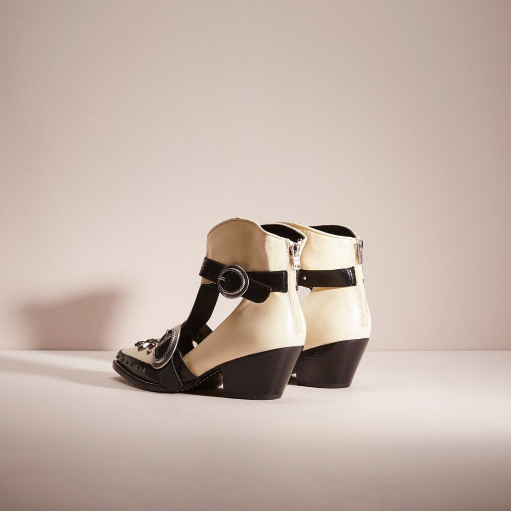 COACH®,Restored Cut Out Western Creeper Bootie,Rubber,Leather,Bootie,Rhinestones,Cut Out,Color Block,Studded,Twist,Pull Ta...,Cream,Back View