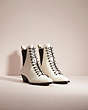 COACH®,RESTORED LACE UP BOOTIE,Ivory,Angle View