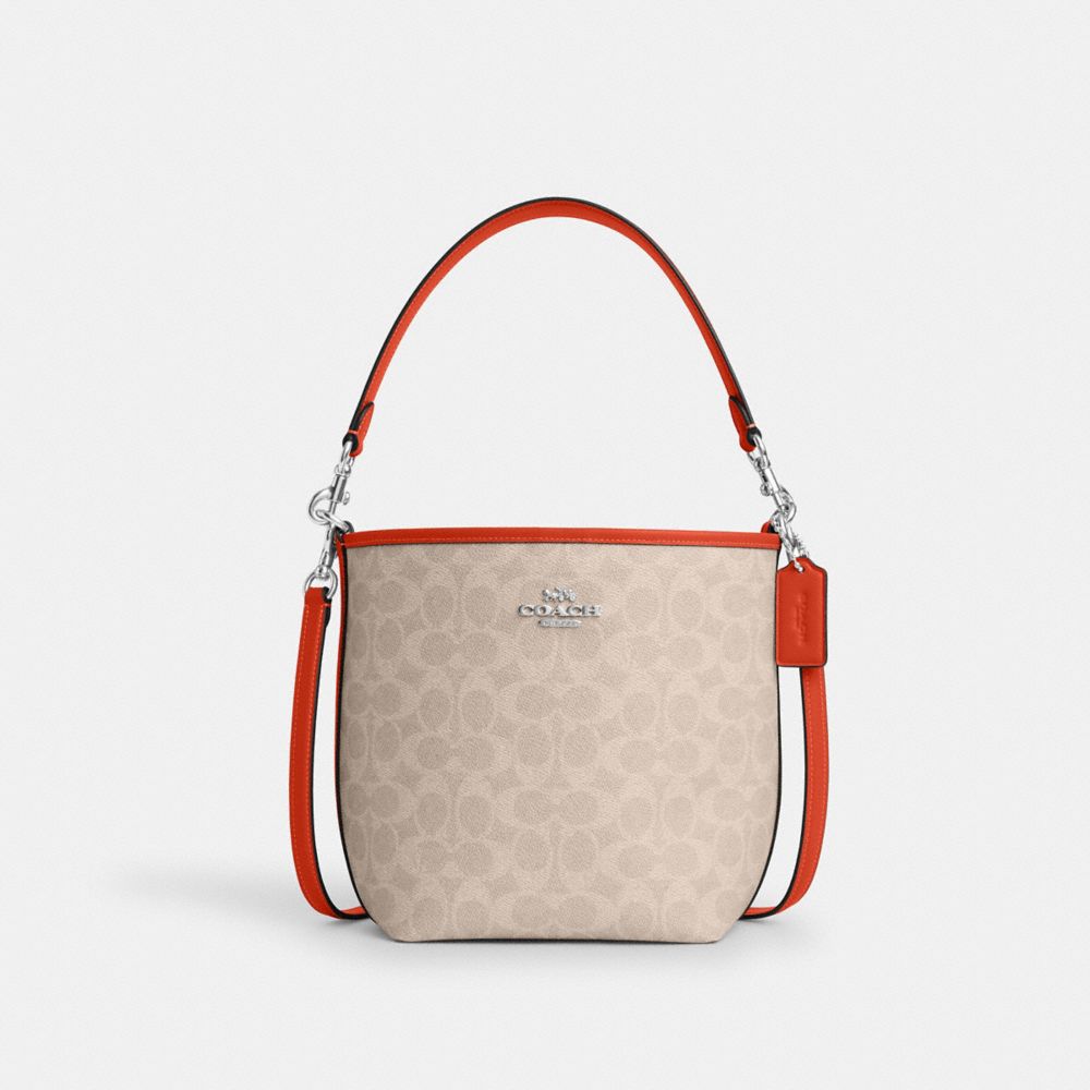 COACH®,SAC SEAU VILLE EN TOILE SIGNATURE,Toile exclusive,Argent/Sable/Orange intense,Front View