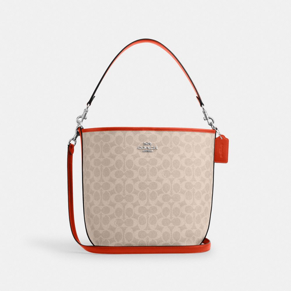 COACH®,GRAND SAC SEAU CITY EN TOILE SIGNATURE,Toile exclusive,Sv/Sable/Orange Intense,Front View