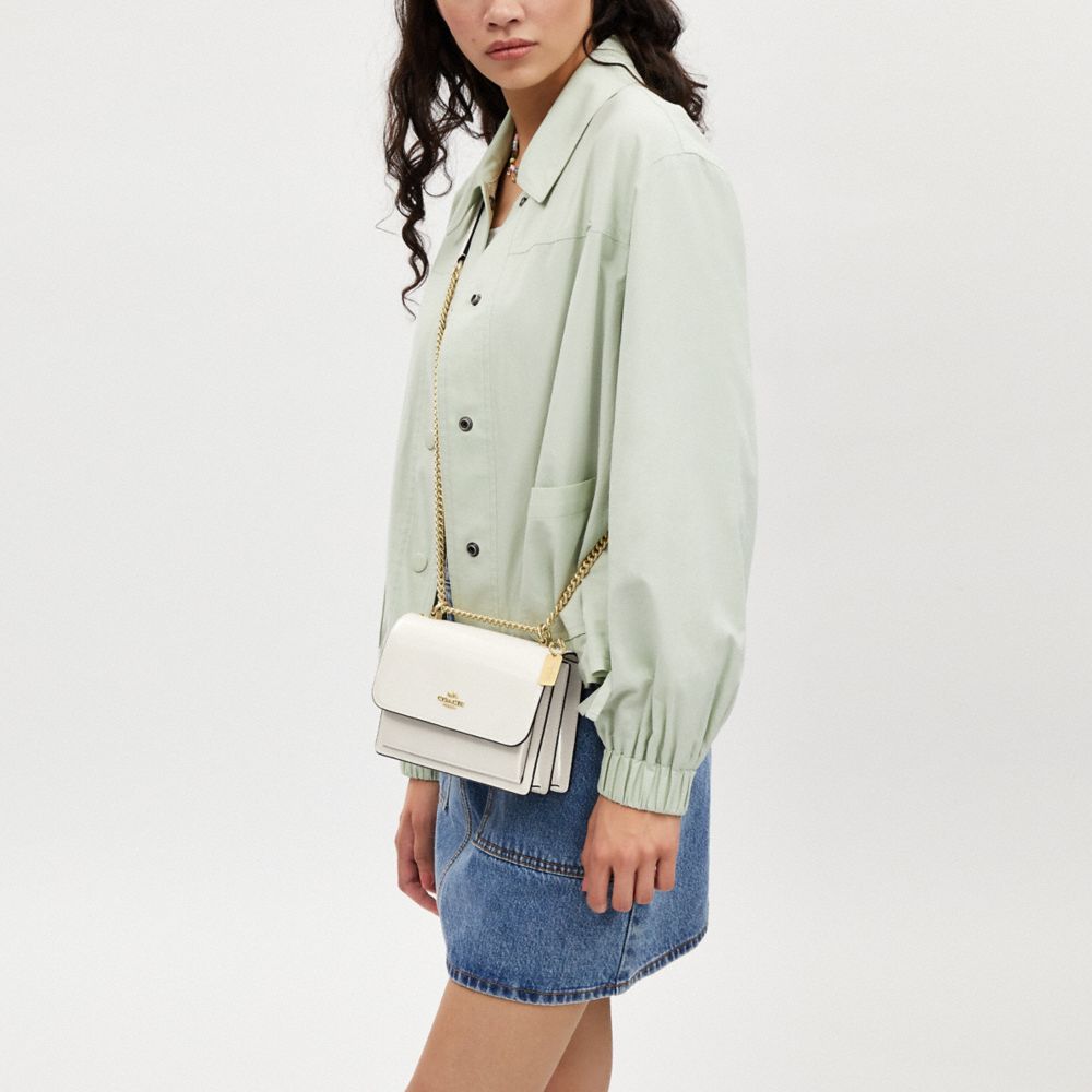 【COACH】パテントレザー製 ミニクレア クロスボディ CT865 公式】コーチアウトレット | ミニ クレア クロスボディ