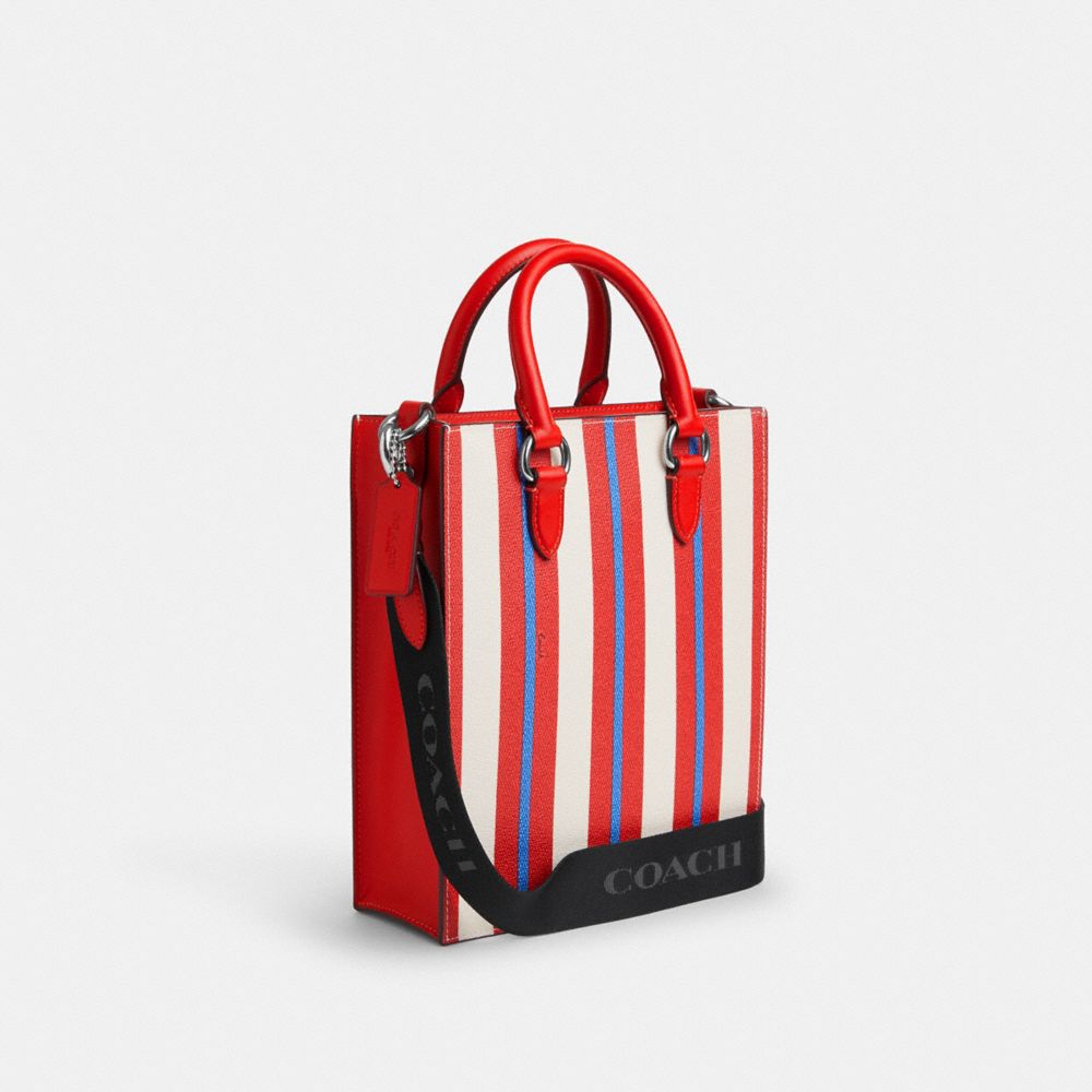 COACH®,DYLAN TOTE BAG WITH STRIPE PRINT,Novelty Print,Silver/Miami Red Multi,Angle View