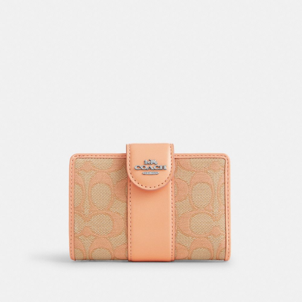 COACH®,MEDIUM CORNER ZIP WALLET IN SIGNATURE JACQUARD,Sv/Faded Blush,Front View