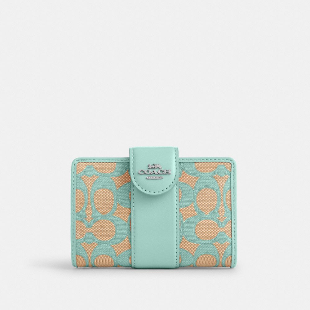 COACH®,MEDIUM CORNER ZIP WALLET IN SIGNATURE JACQUARD,Sv/Faded Blue,Front View