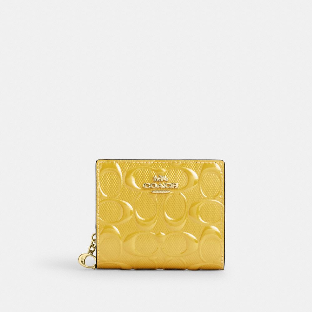 Mustard yellow coach wallet sale