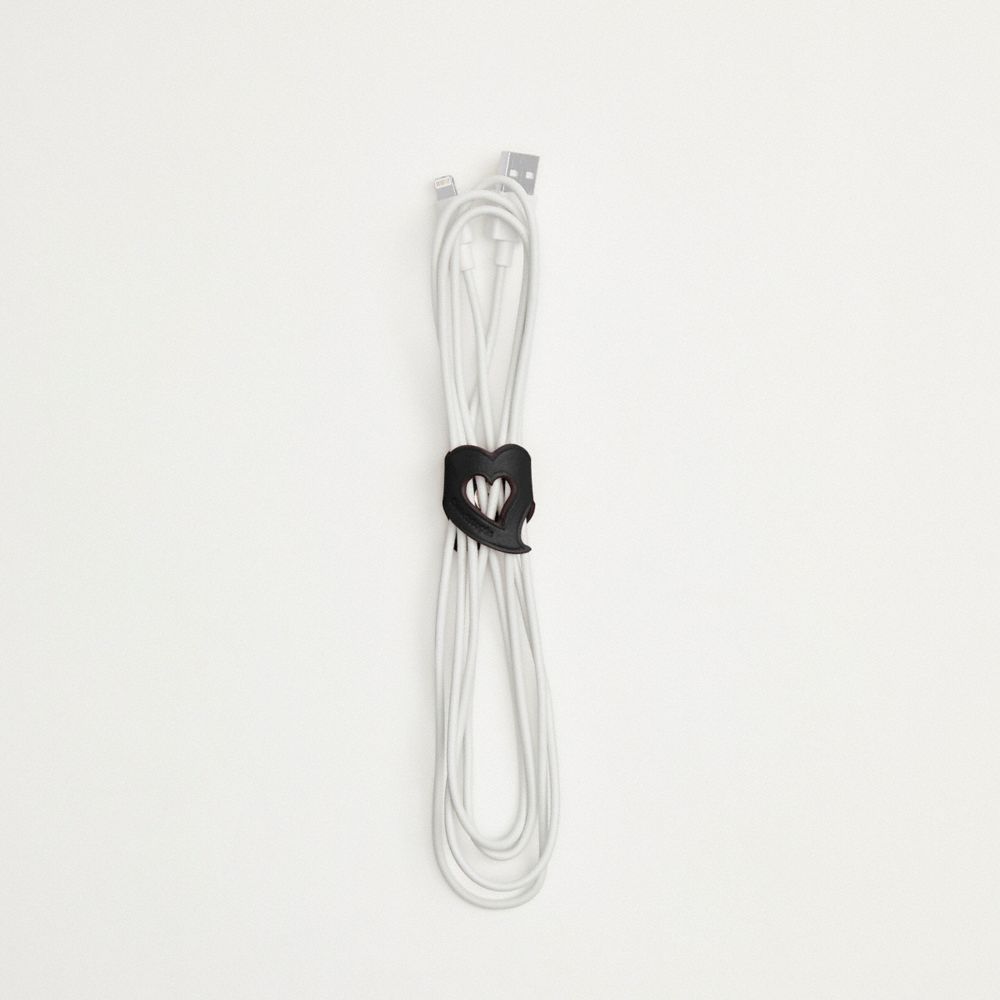 COACH®,Coachtopia Heart Cord Holder In Upcrafted Leather,,Angle View