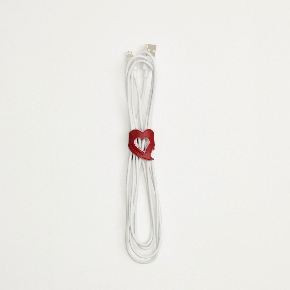 COACH®,Coachtopia Heart Cord Holder In Upcrafted Leather,,Angle View