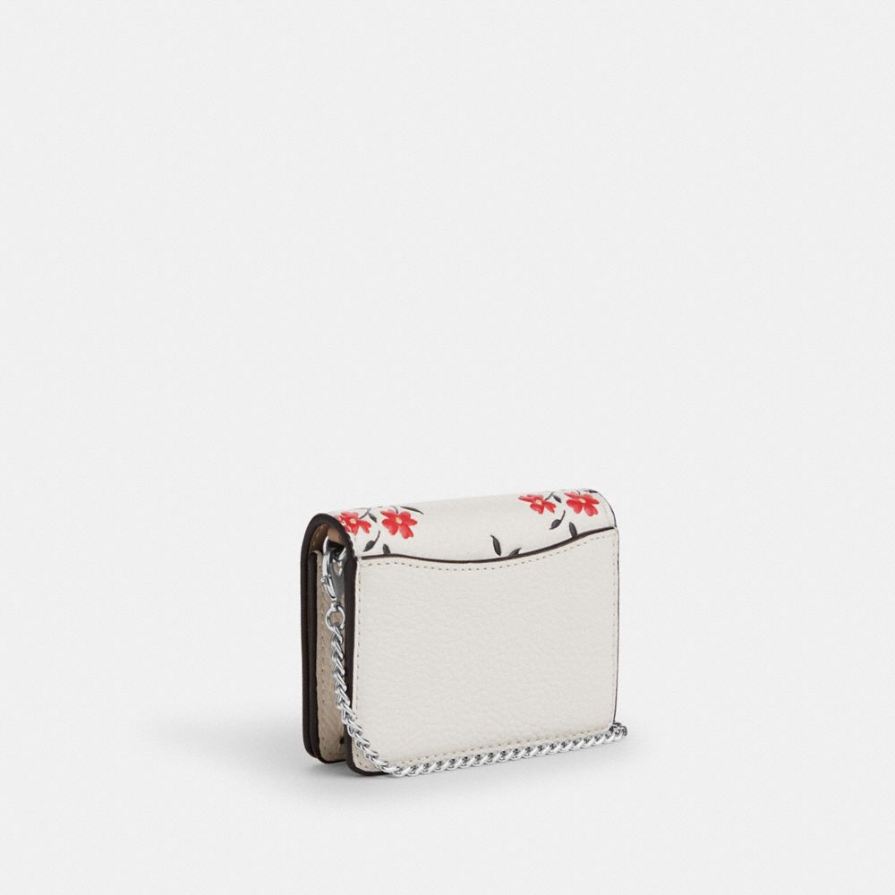COACH®,MINI WALLET ON A CHAIN WITH FLORAL PRINT,Novelty Leather,Silver/Chalk Multi,Angle View