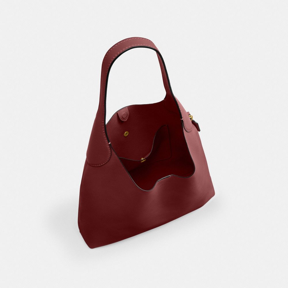 Coach In Brass/dark Ruby