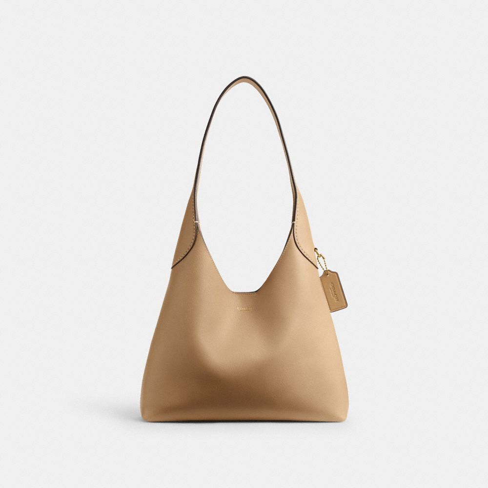 Coach beige purse sale