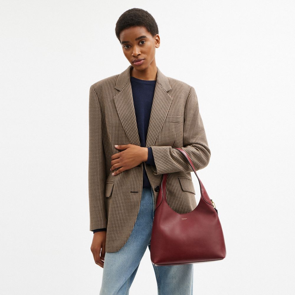 Coach In Brass/dark Ruby
