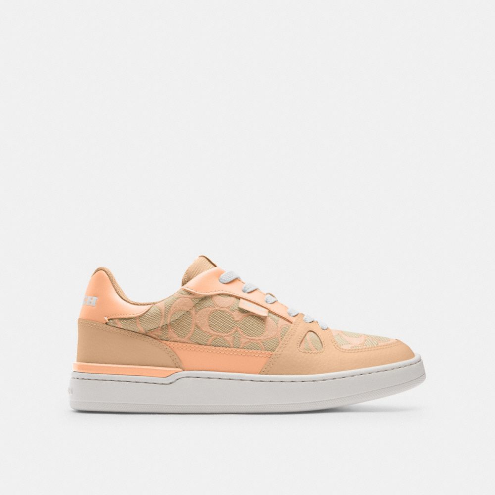 COACH®,CLIP LOW TOP SNEAKER IN SIGNATURE JACQUARD,Faded Blush,Angle View
