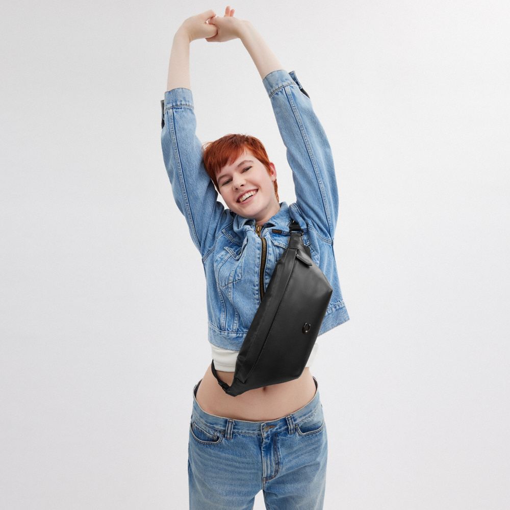 COACH®,Hall Belt Bag,Leather,Belt Bag,Metal,Logo,Engraved Detail,Adjustable,Casual,Black,Angle View
