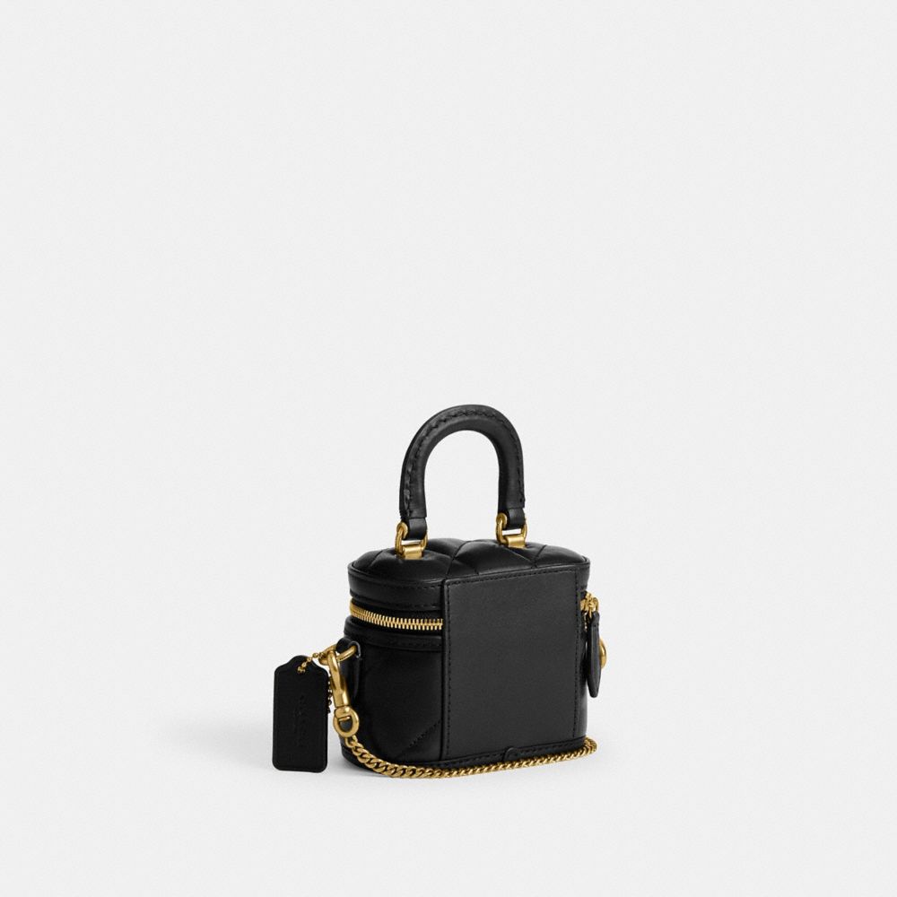 Coach In Brass/black