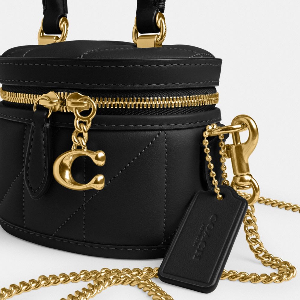 Coach In Brass/black