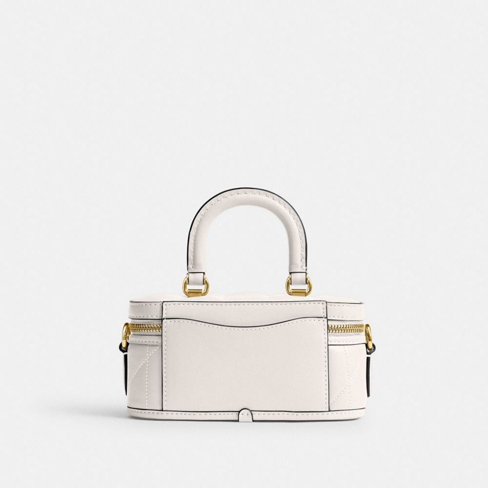 Coach In Brass/chalk