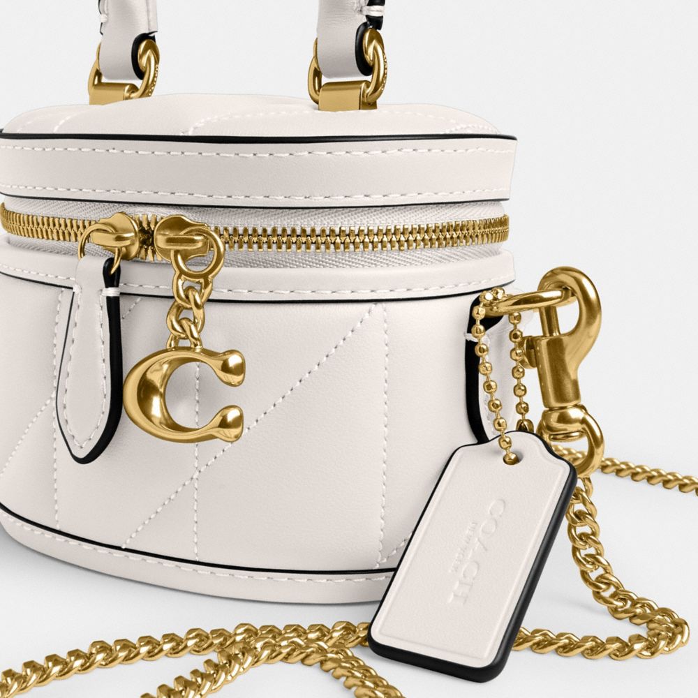 Coach In Brass/chalk