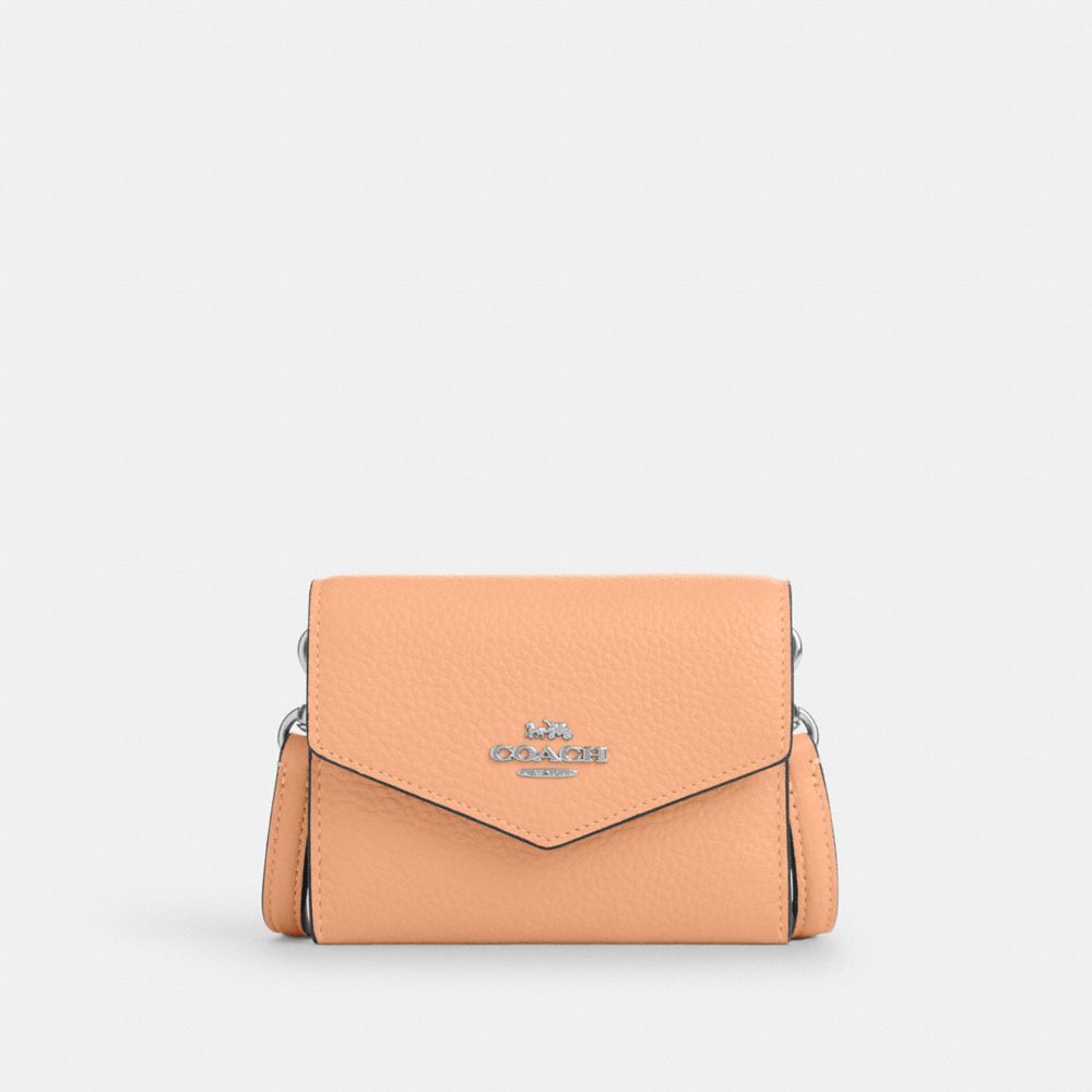COACH®,MINI ENVELOPE WALLET WITH STRAP,Pebbled Leather,Mini,Sv/Faded Blush,Front View