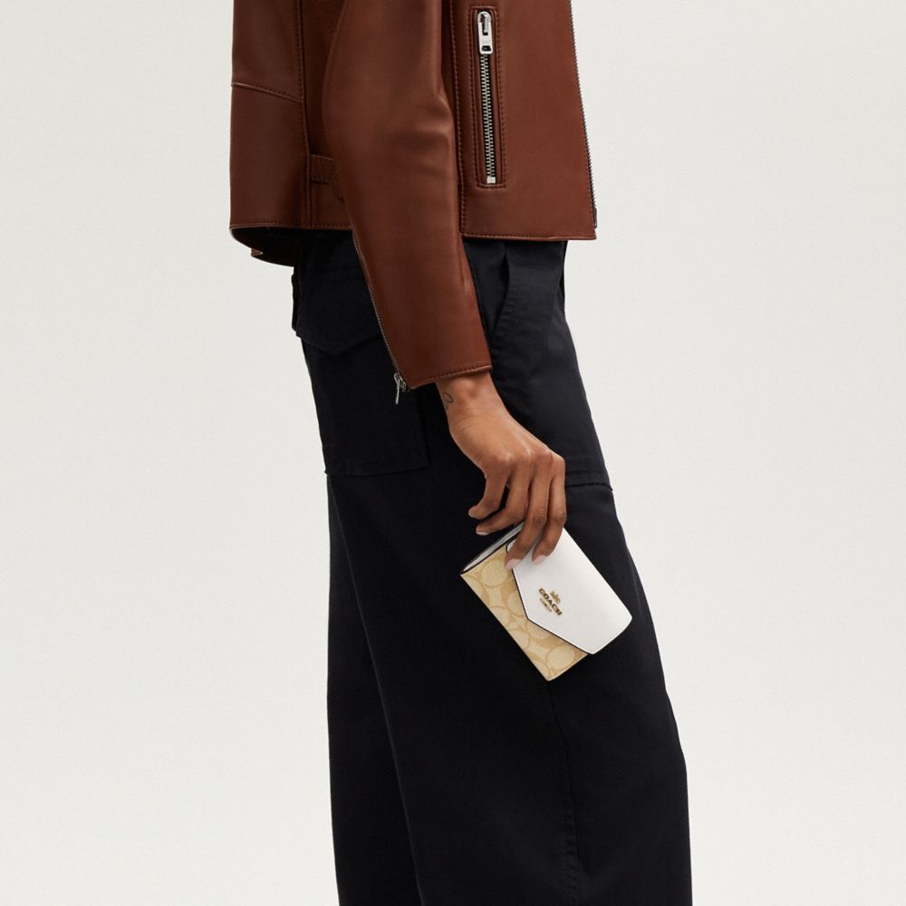 COACH®,Mini Envelope Wallet With Strap In Signature Canvas,Leather,Continental,Color Block,Casual,Beige,Detail View
