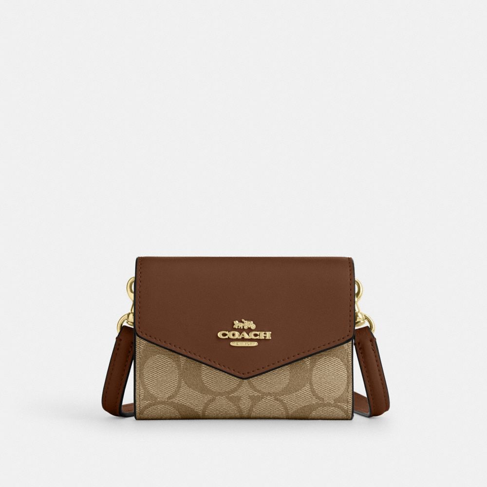 COACH®,MINI ENVELOPE WALLET WITH STRAP IN SIGNATURE CANVAS,Signature Canvas,Mini,Gold/Khaki Saddle 2,Front View