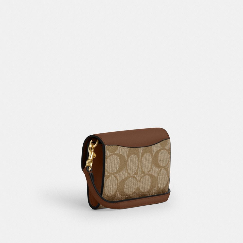 COACH®,MINI ENVELOPE WALLET WITH STRAP IN SIGNATURE CANVAS,Signature Canvas,Mini,Gold/Khaki Saddle 2,Angle View