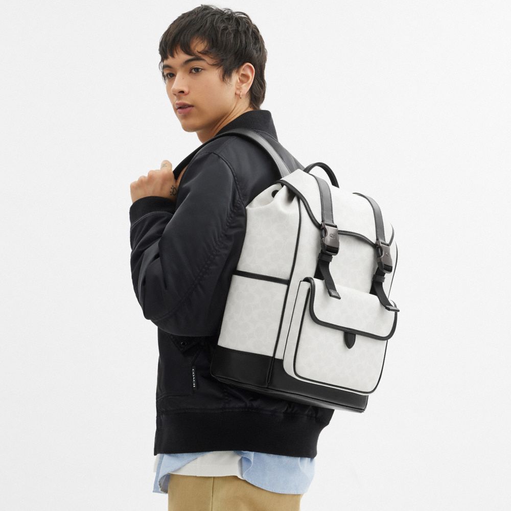 Coach League Flap Backpack In Signature Canvas
