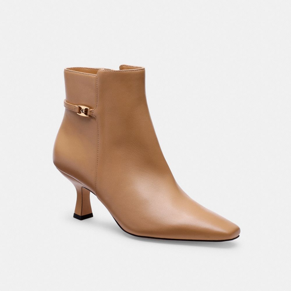 Shop Coach Rebecca Bootie In Tan